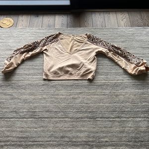 Boho Free People top with a flared sleeve